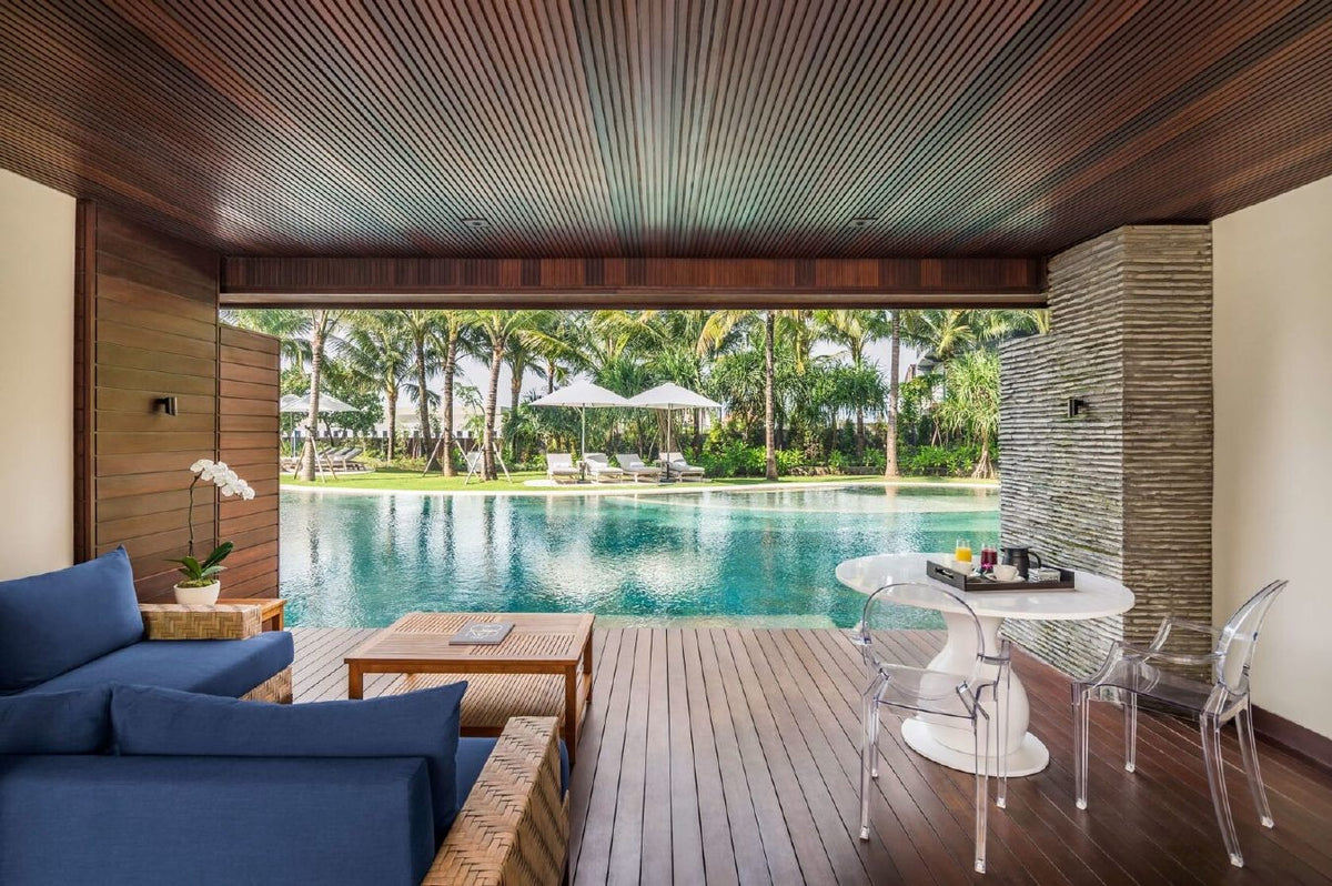 A resort pool in Canggu at dusk