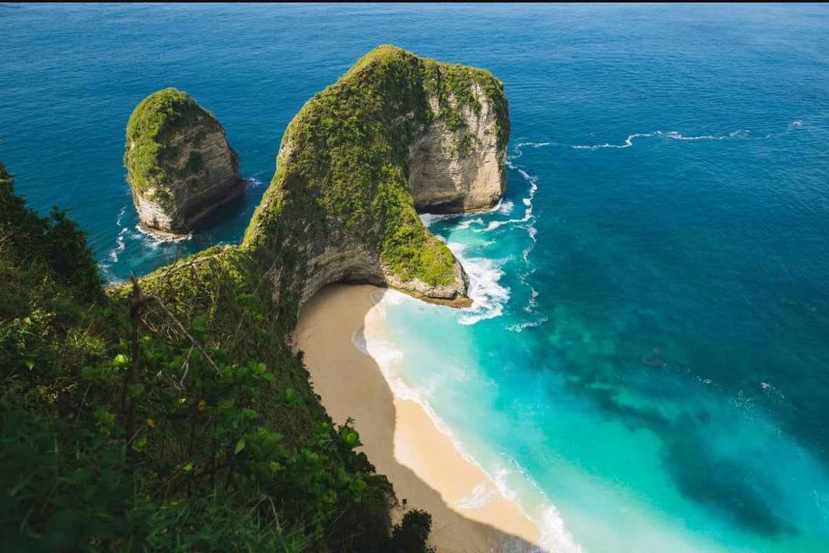The turquoise bay below Kelingking cliff, Nusa Penida